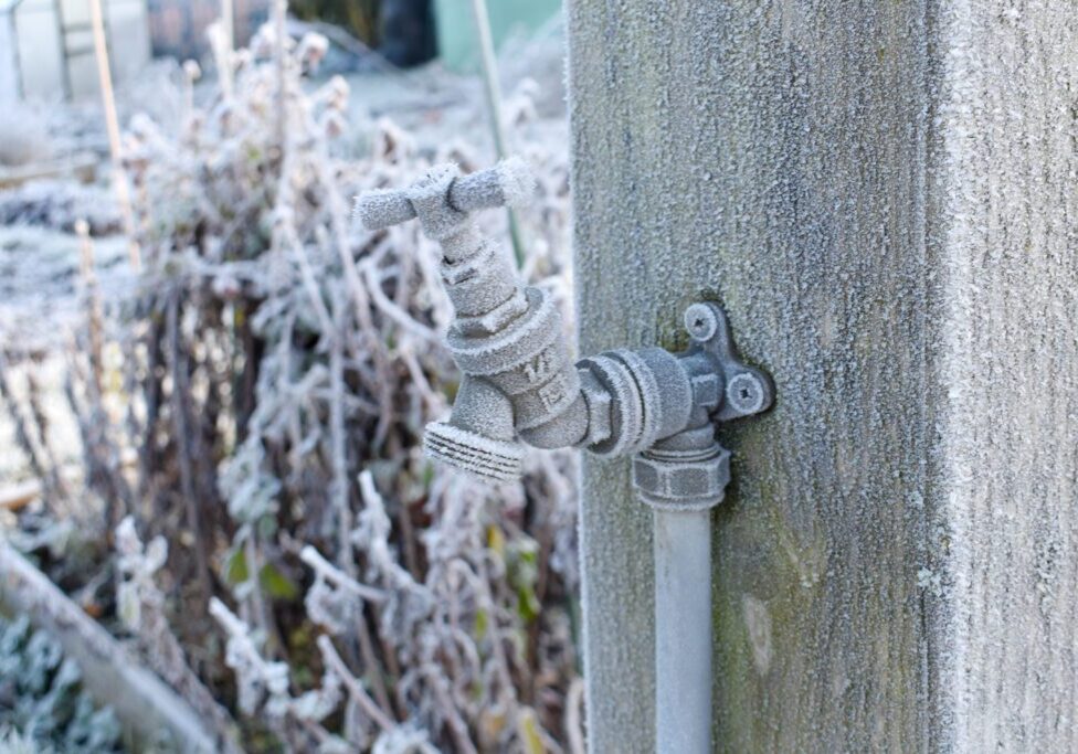 Icy tap on cold winter morning